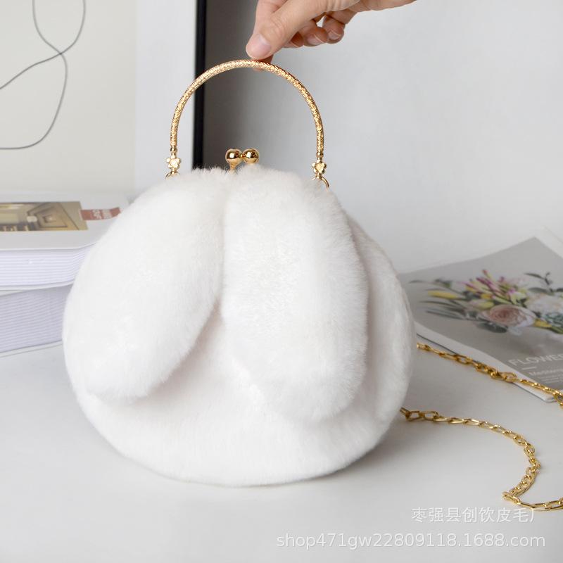

Plush rabbit bag female oblique cross Korean version cute portable fluffy bag autumn and winter new rabbit ear clip bag clip bag белый