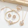 Europäischer und Amerikanischer Stil Vergoldetes Pfirsichherz Schmuckset: Kupfer-Mikro-Inlay Zirkon Ohrringe, Halskette und Ring.