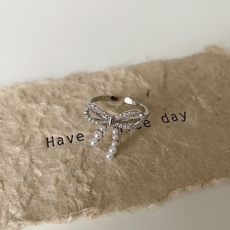 

Изящное кольцо с бантом из циркона и жемчугом, женское, легкое, роскошное, элегантное, нежное, индивидуальное, модное, универсальное кольцо