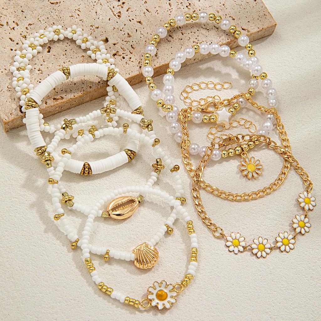 9 Elegant and Simple Daisy Rice Bead Bracelets with Multi Layer Stacking Soft Ceramic Shell Metal Women's Bracelet Set