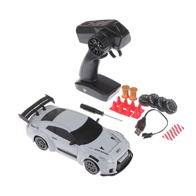 

Радиоуправляемая высокоскоростная дрифт-машина Гоночная машина на радиоуправлении Дрифт-машины 1/24 Модель автомобиля 4WD Высокая скорость 2.4G Радиоуправление Пульт C B