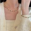 Niche fashion temperament wind handmade beaded collarbone chain S925 sterling silver horseshoe snail freshwater pearl necklace