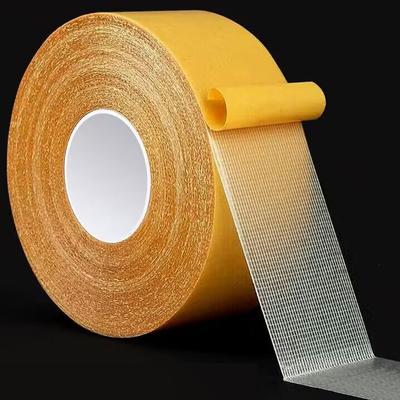 Çift Taraflı Bant Güçlü Yüksek Viskozite İz Bırakmayan Kumaş Tabanlı Izgara Bant Su Geçirmez Halı Yapıştırıcı Elyaf Bant Ağ Yapışkan Şeritler