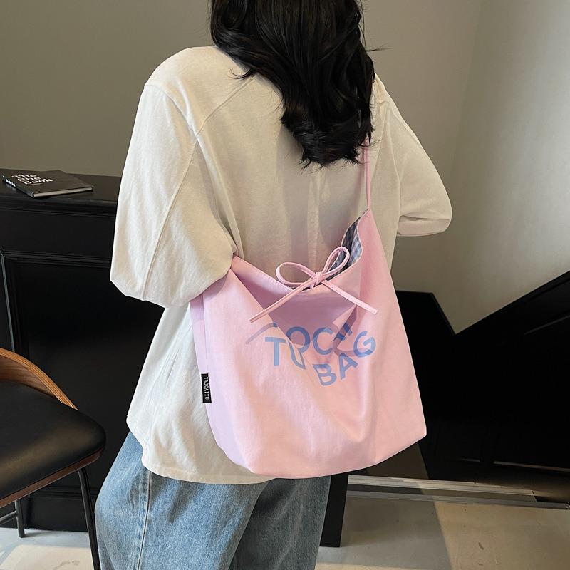 Lazy and lightweight cloth bag, tote bag, niche literary and artistic large-capacity shoulder bag, double-sided usable messenger bag.