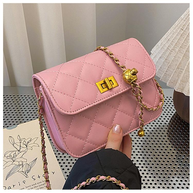 

Spring new golden ball chain small square bag women s bag fragrant single shoulder fashion women s bag trend diagonal span mobile phone bag рожевий