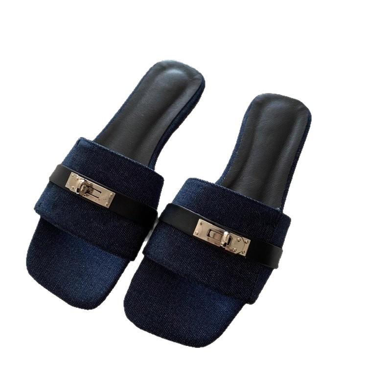 Soft leather version~ niche lock one-word slippers women's summer 2025 new outer wear flat-bottomed French sandals women's shoes