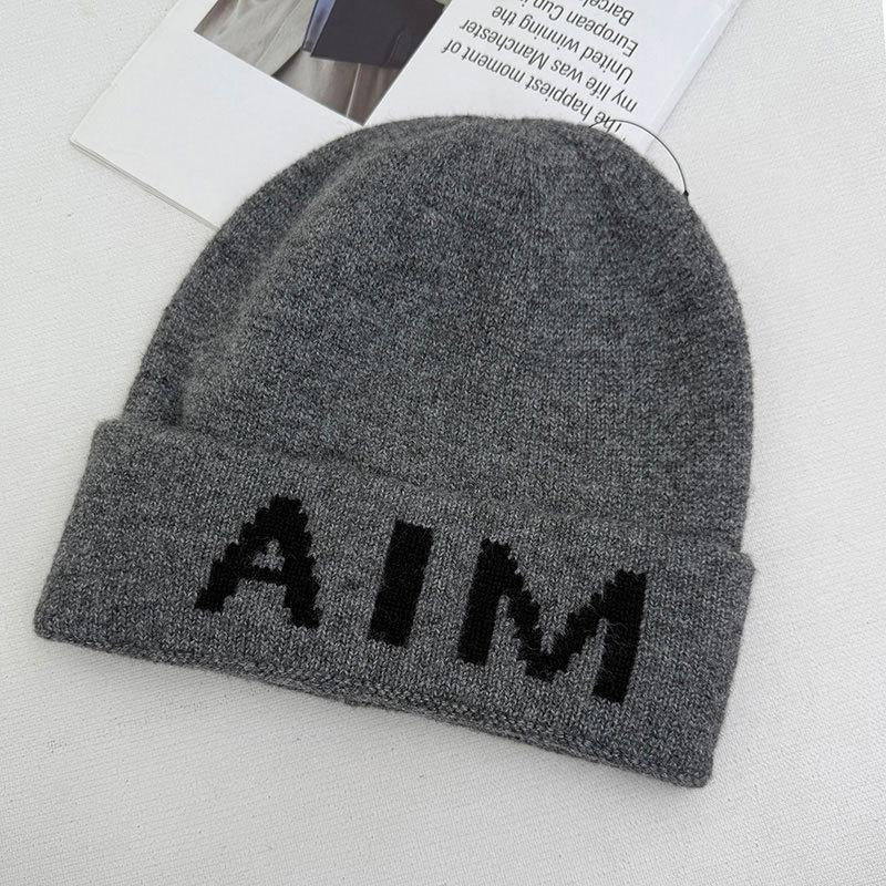 Niche personalized letter knitted hat children's autumn and winter new wool hat warm ear protector bag head cold hat