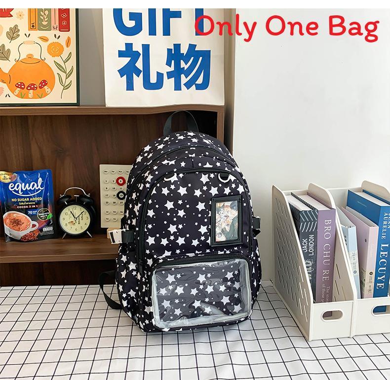 

Простой нейлоновый школьный рюкзак с контрастной строчкой и изогнутыми лямками чёрный