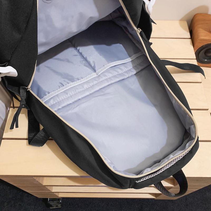 Schoolbag Japanese simple and fashionable backpack 1011 summer new middle school schoolbag college student college style alphabet backpack