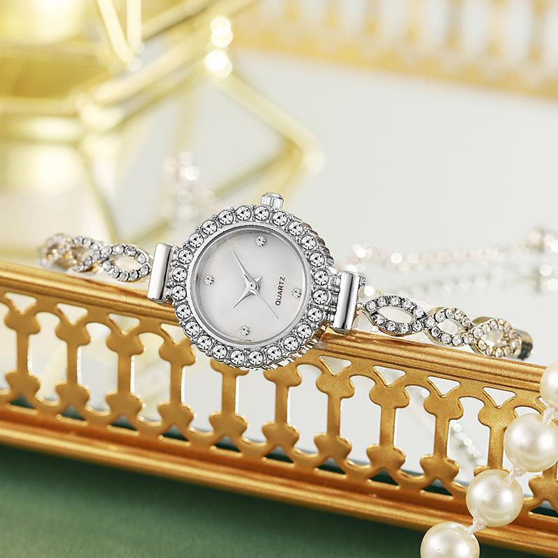 Abbildung 8 Mode Diamant-besetzte Damenuhr Damen Quarzuhr freie Einstellung Armbanduhr