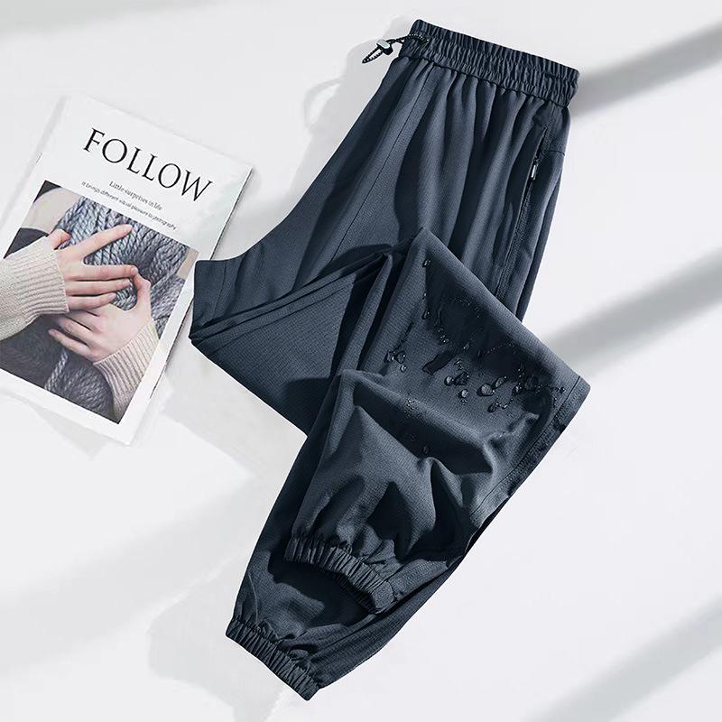 Pantalon de randonnée softshell coupe-vent et imperméable pour femmes de Bird, adapté aux sports de plein air et aux loisirs de printemps, d'automne et d'été.