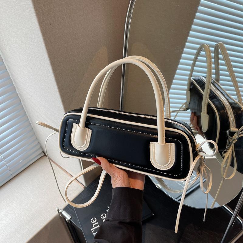 

Niche design bag women s new fashion versatile messenger bag high-end sense contrasting color portable baguette bag чёрный