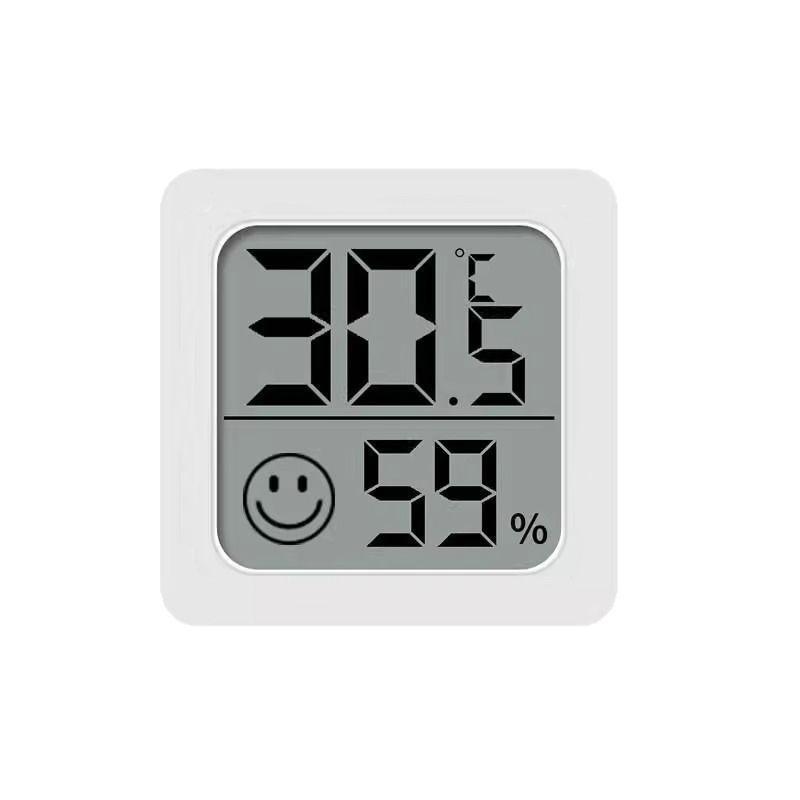 

Indoor Home Office LCD Mini Smiley Face Temperature and Humidity Thermometer white