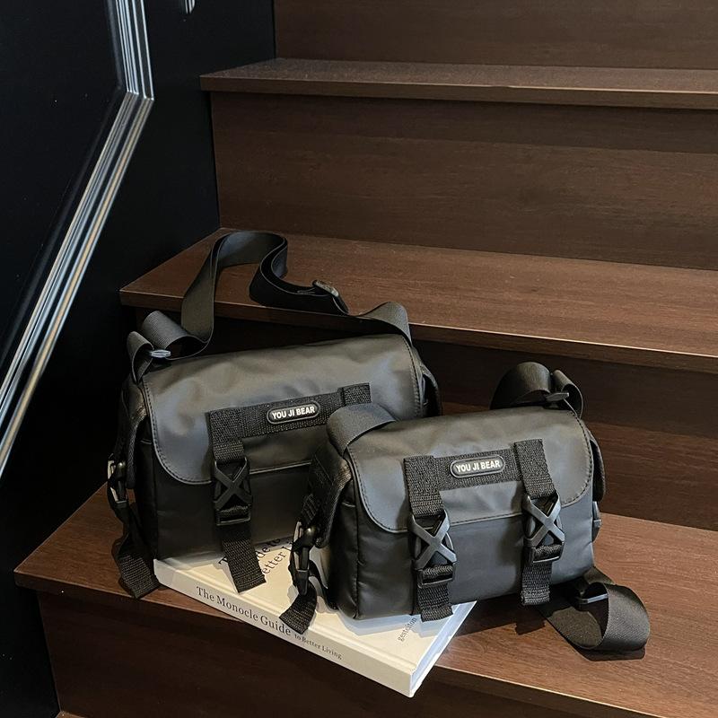 

Сумка-мессенджер темный ветер повседневные мужские и женские сумки 2025 новая ретро универсальная сумка-мессенджер путешествия налегке плечо Small чёрный