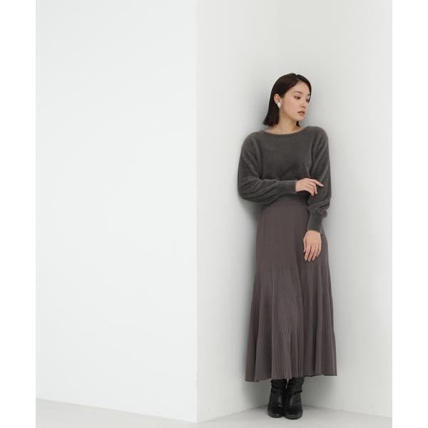 Fjäderdockningsstickad klänning