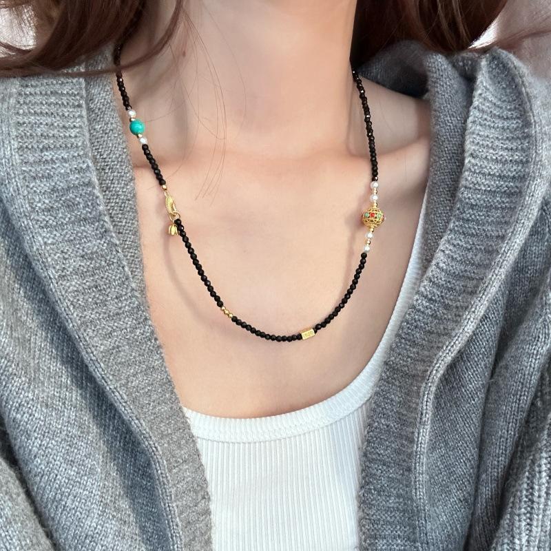 

Original minimalist high-end black spinel alloy rhodochrosite49+5cm Sweater chains offer a variety of unique styles and personalities Black spinel alloy marmol