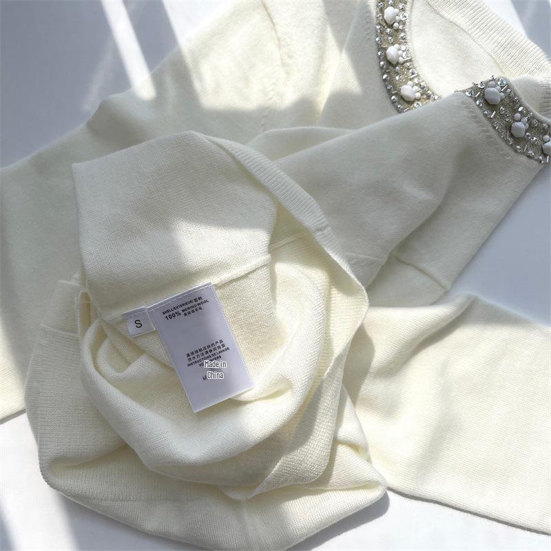 Elegant Hua Lun Single-Breasted French Wool Cardigan - Thin Solid Color, Long Sleeve, Round Neck Sweater.