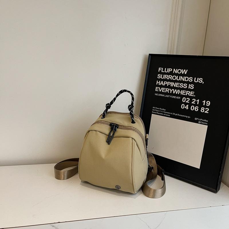 

Fashion sense small backpack women s lightweight casual shoulder bag new fashion commuter shell bag simple commuter messenger bag хаки