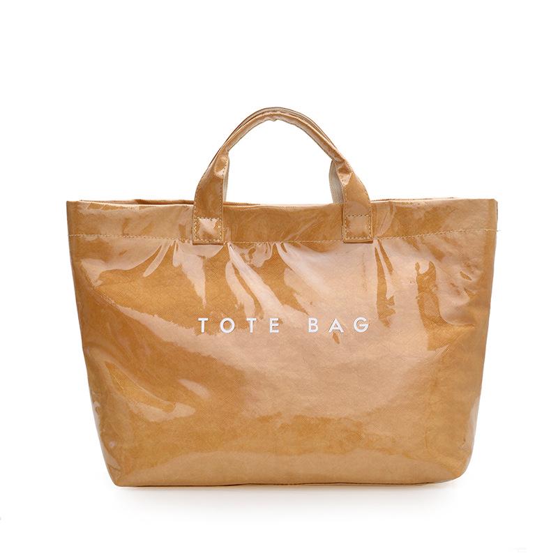 

Высококачественная женская сумка-тоут из бумаги Дюпон: Вместительная, стильная и универсальная повседневная сумка