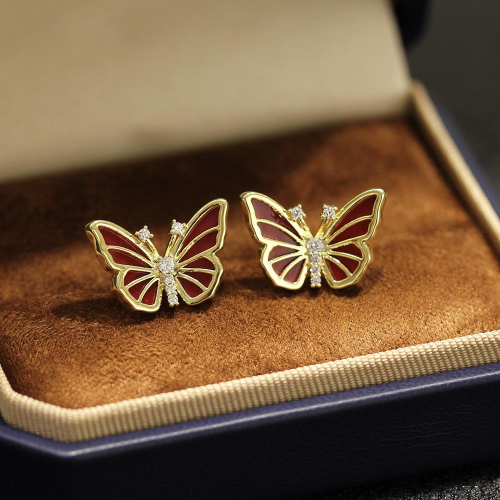 New Year's Red Oil Drip Stone Butterfly Earrings Gold-plated Versatile Insect 925 Silver Needle Stud Earrings Women's Earrings