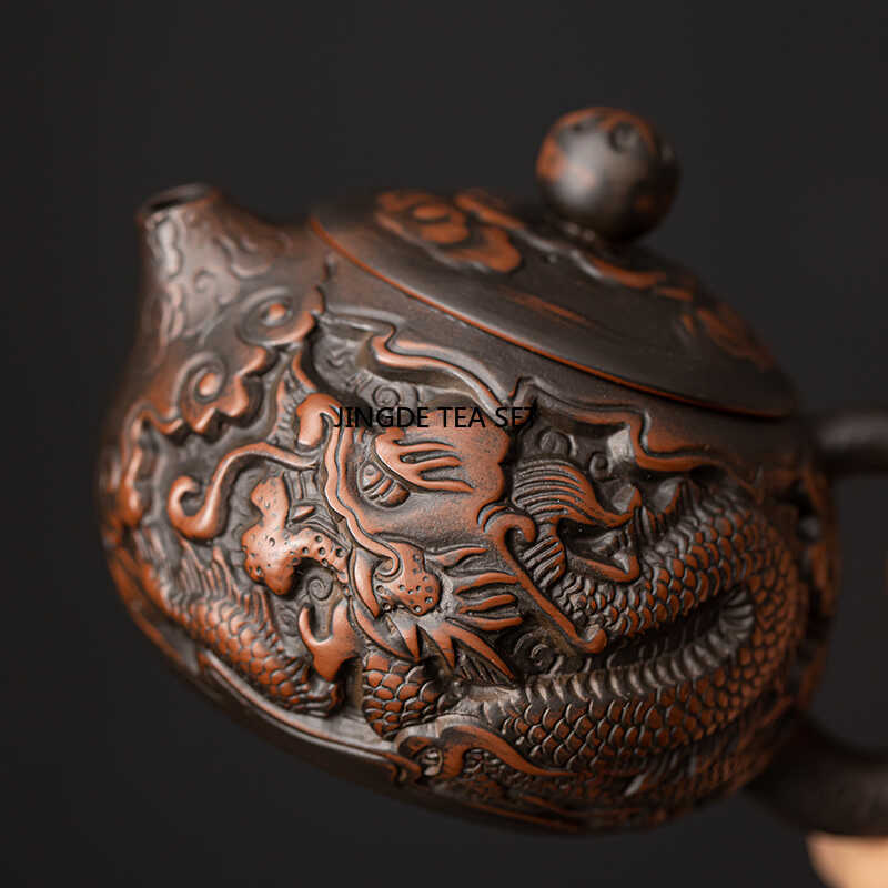 Small capacity purple pottery Xiao Long handmade antique relief teapot household kung fu tea set