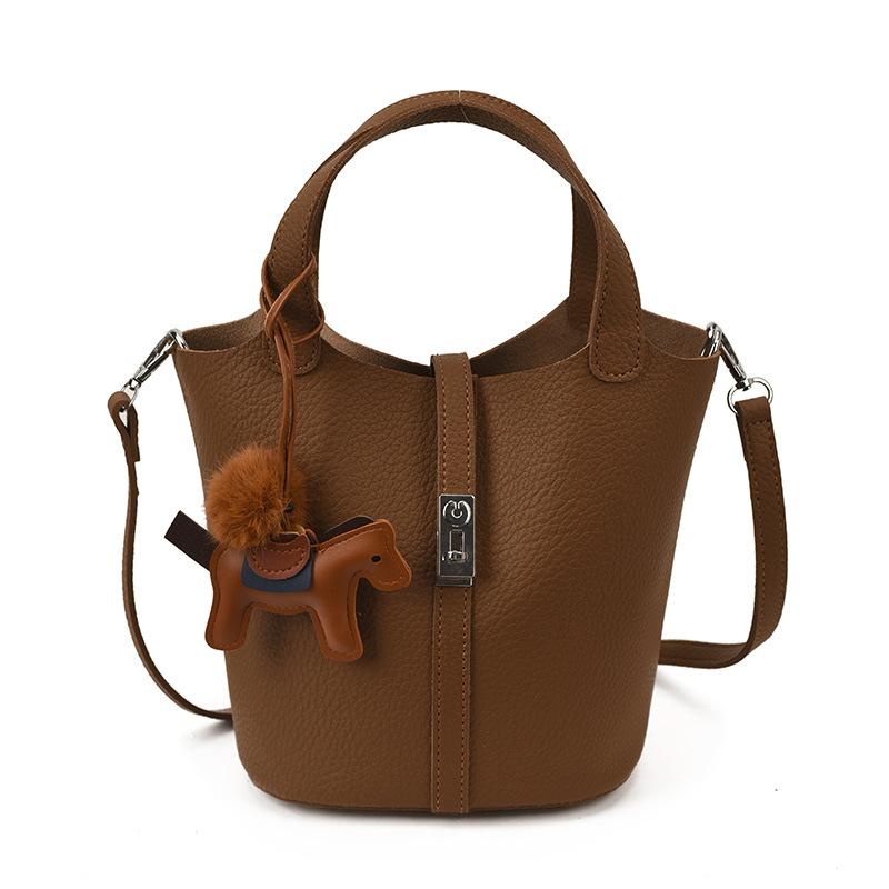 Fashion vegetable basket bucket bag women's 2025 autumn new high-value shoulder bag simple solid color niche messenger bag