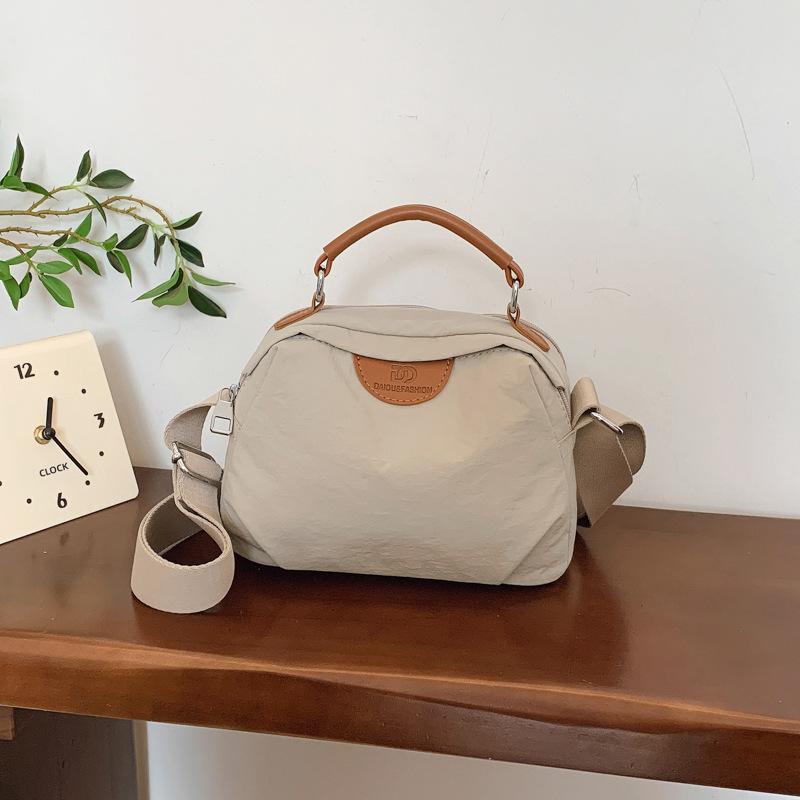 

Casual canvas handbag small bag women s bag 2025 new simple small square bag versatile shoulder messenger bag хакі