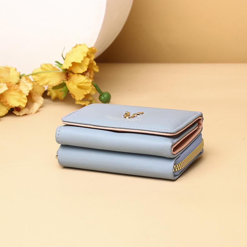 Dámská třískládací peněženka v korejském stylu pro rok 2025 se zipovou kapsou na mince a kresleným designem
