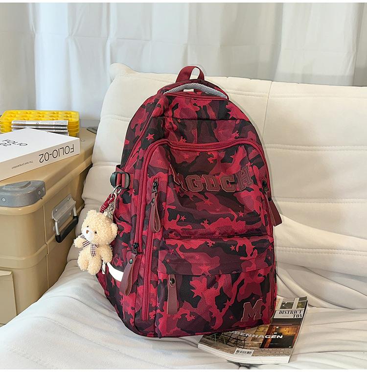Schoolbag schoolbag female burden reduction large-capacity backpack male can hang tie rod college student travel commuter backpack tie-dye bag