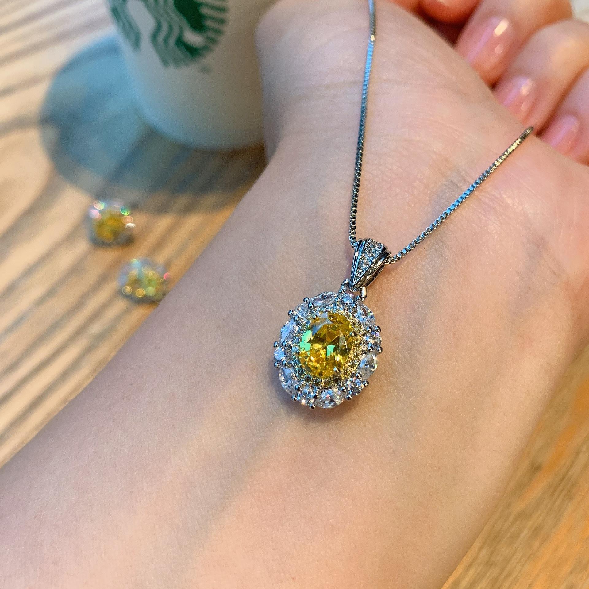 

Ожерелье из двух серег-гвоздиков с имитацией золотого циркония, комплект из двух предметов, комплект украшений в стиле «темперамент», модель в форме яйца.