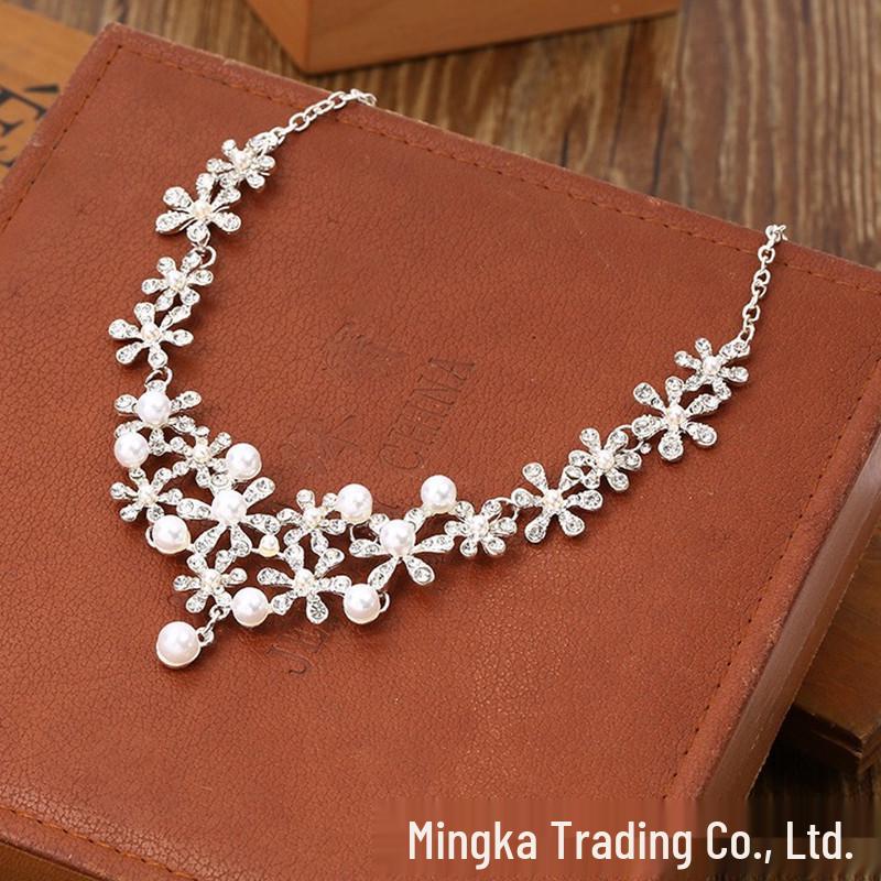 Elegant Pearl and Crystal Jewelry Set: Necklace, Earrings, & Bracelet for Brides