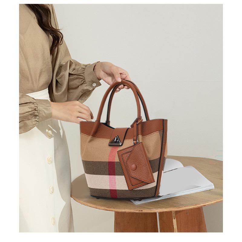 Neue hochwertige Canvas-Beuteltasche mit Rindsleder für Damen, trendige neue schräge High-End-Damentasche