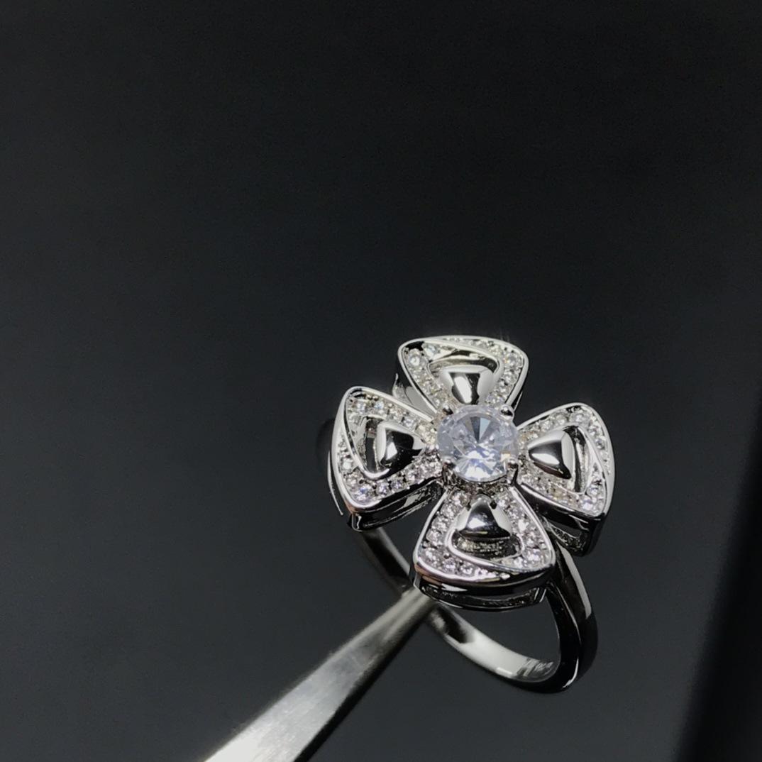 

Кольцо Baojia из серебра 925 пробы с инкрустацией бриллиантами в виде четырехлистного клевера - Двойной ряд с полым дизайном ветряной мельницы Size 7