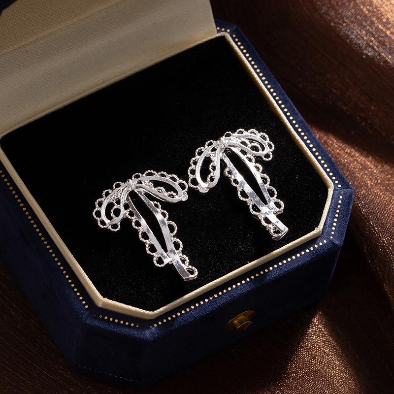 Cold Wind Hollow Bow Stud Earrings Women S Simple Niche Design Temperament Versatile High-End Sense Ribbon Earrings Earrings