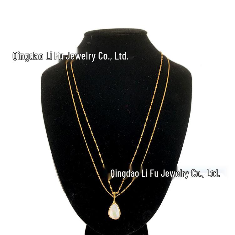 Tropfenförmige Halskette im französischen Stil aus 925er Sterlingsilber mit Naturstein aus weißem Muschelkalk