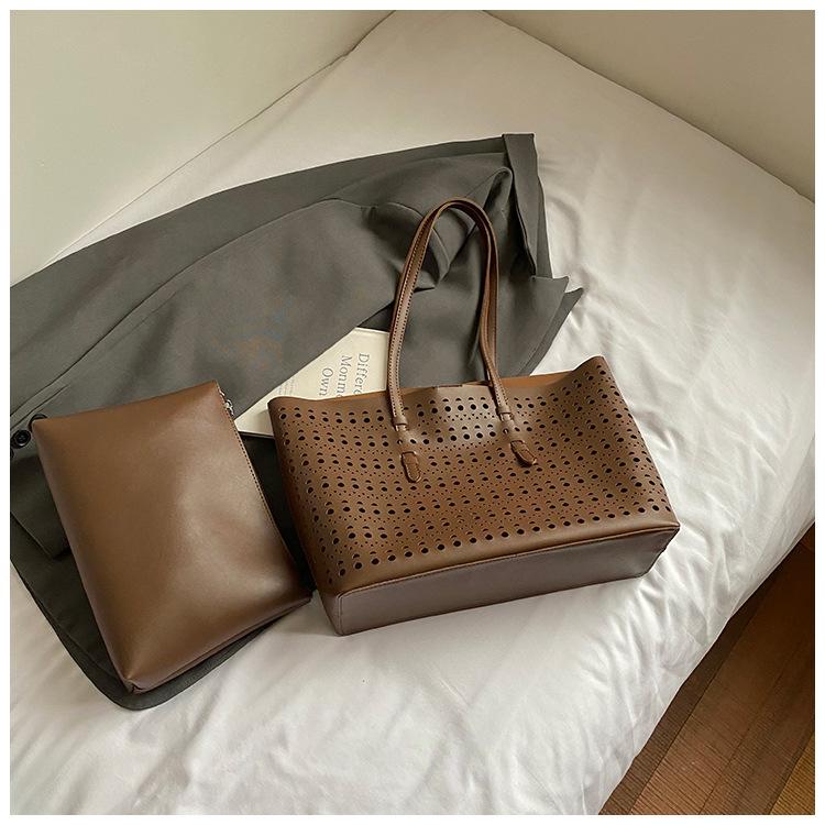 2025 spring and summer new niche high-end hollow tote bag large-capacity temperament commuting single shoulder child and mother bag