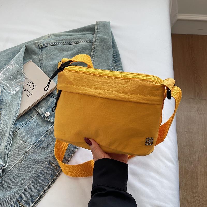

Waterproof portable work spring tide multi-functional casual shoulder messenger cloth жовтий