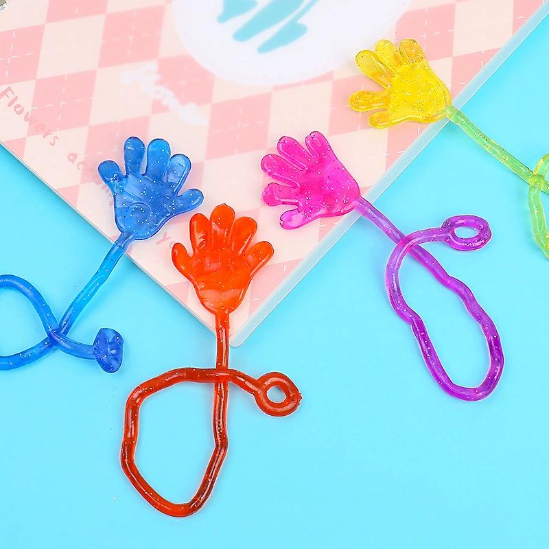 Nostalgic Wall Climbing Sticky Hand Toy - TPR Slap & Vent Prank