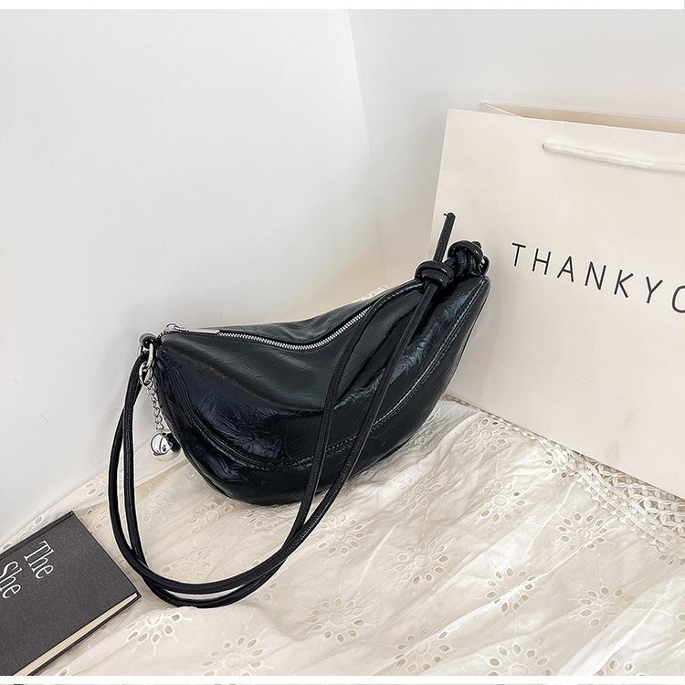 

Премиальная мягкая кожа сумка-пельмень женская трендовая мода полумесяц круассан 2025 новый иностранный стиль на одно плечо мессенджер женская сумка чёрный