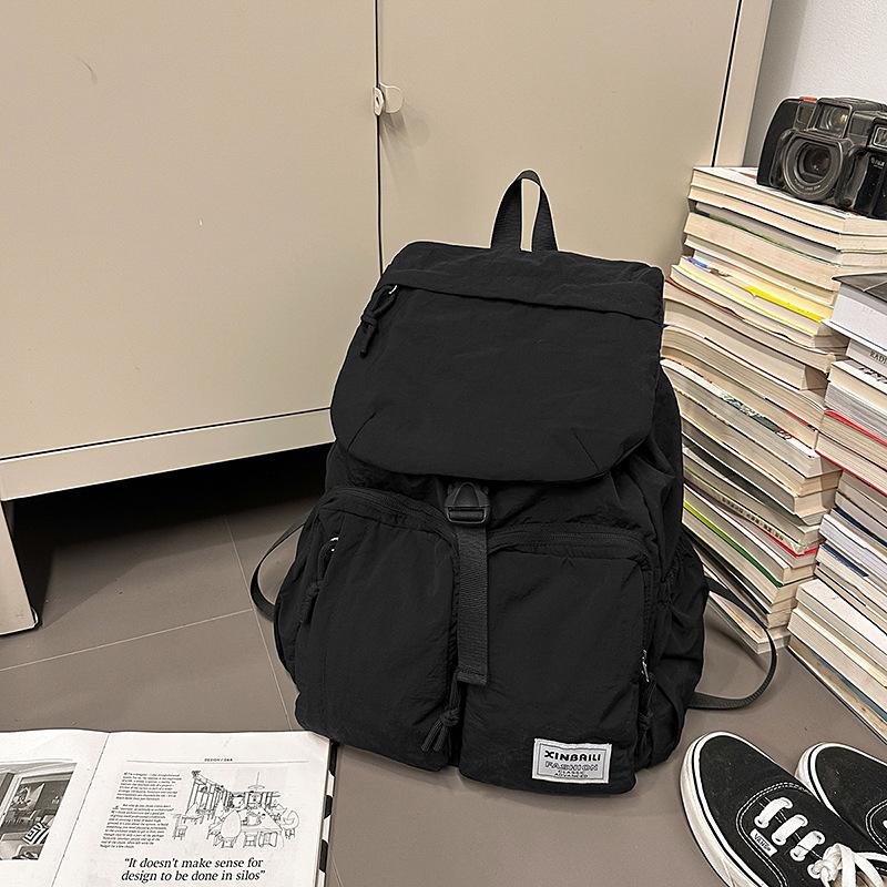Outdoor japanische Farbkombination Rucksack große Kapazität Mehrfachtaschen Schultasche einfacher lässiger Rucksack Spritzwassergeschützt und verschleißfest