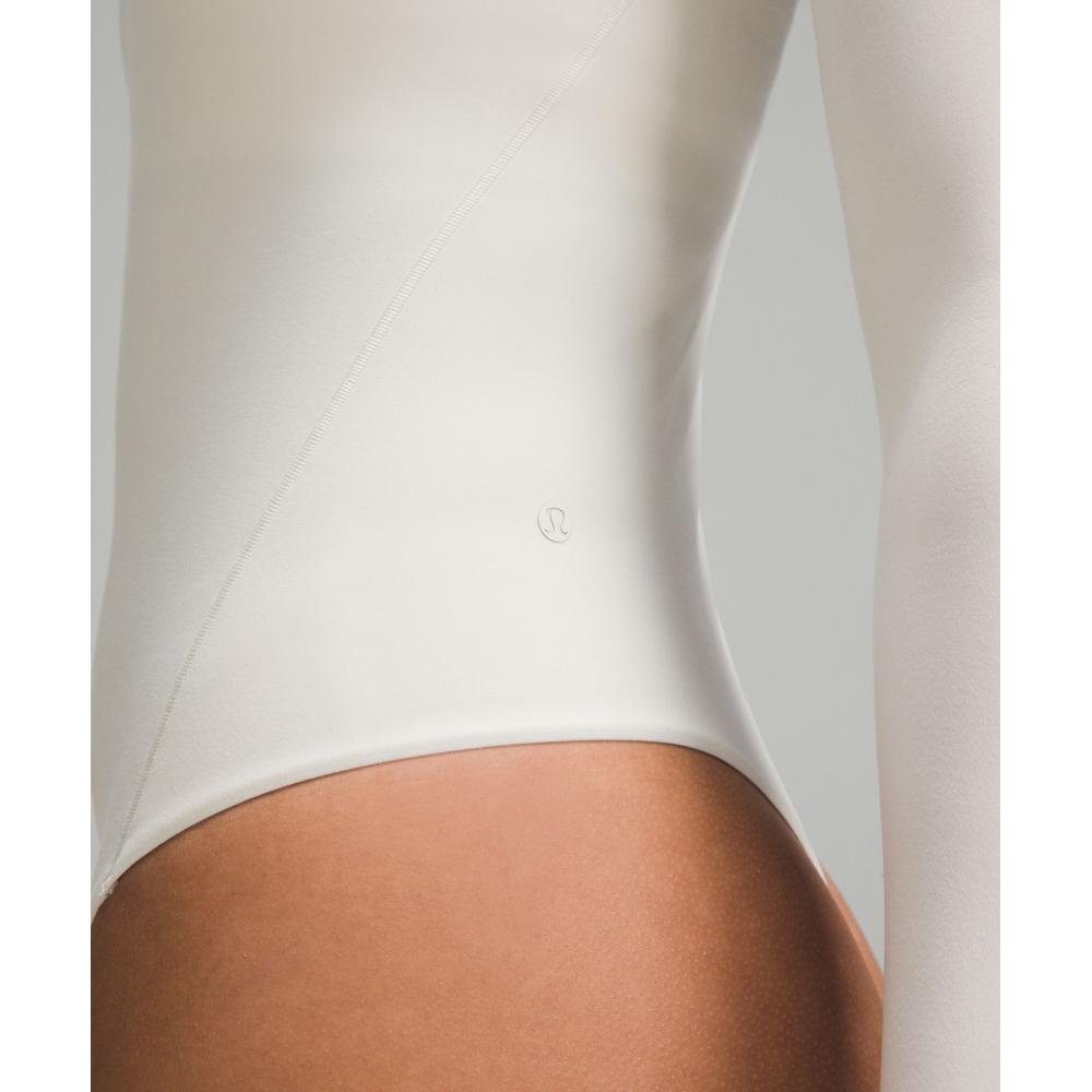 Lululemon Wundermost Ultra Soft Nulu Turtleneck Bodysuit Bone