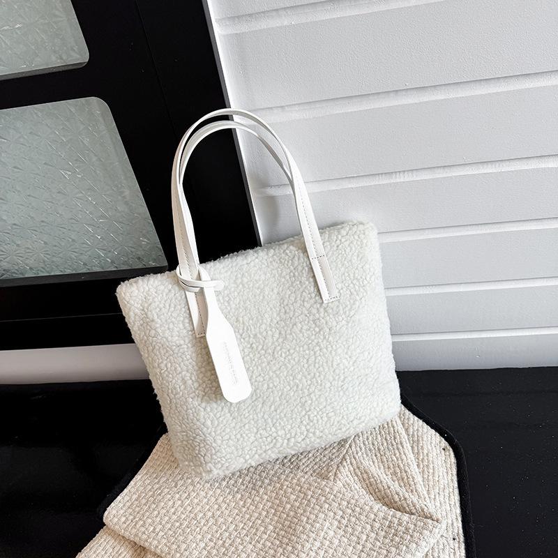Hand carrying plush bucket bag women 2025 autumn and winter new Korean ins trend versatile fashion wool bag shoulder bag