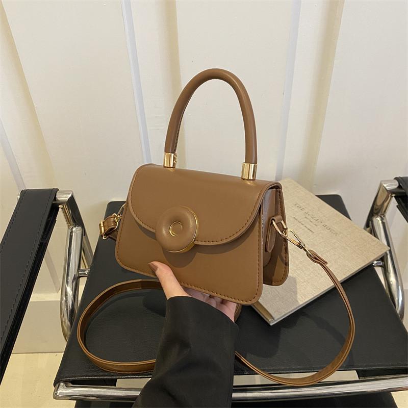 

Stylish Women s 2024 New Minimalist Solid Color Sweet Doughnut Lock Buckle Small Shoulder Crossbody Bag коричневий