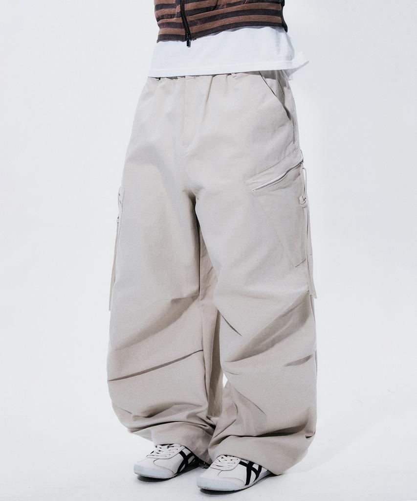 SOMEPLACE MAN Plain Diagonal Zipper Pocket Strap Parachute Wide Pants_2 Colors