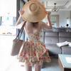Seaside vacation floral suspender dress women's spring and summer pure desire beautiful temperament waist slim fluffy short skirt