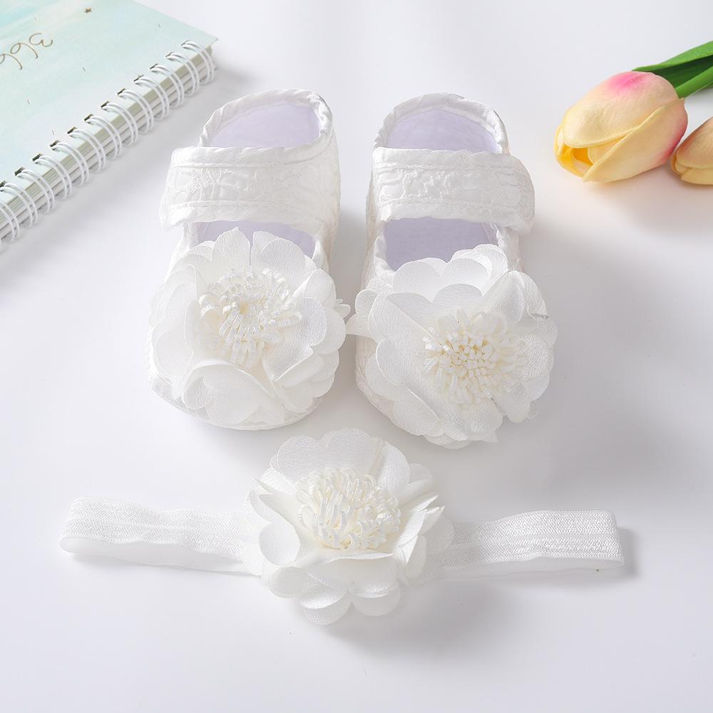 Witte Kant Baby Meisje Ledikant Schoentjes & Bijpassende Elastische Hoofdband Set, Pasgeboren Zacht Antislip Zool Satijnen Strik Bloemen Mary Jane Prinses Schoenen