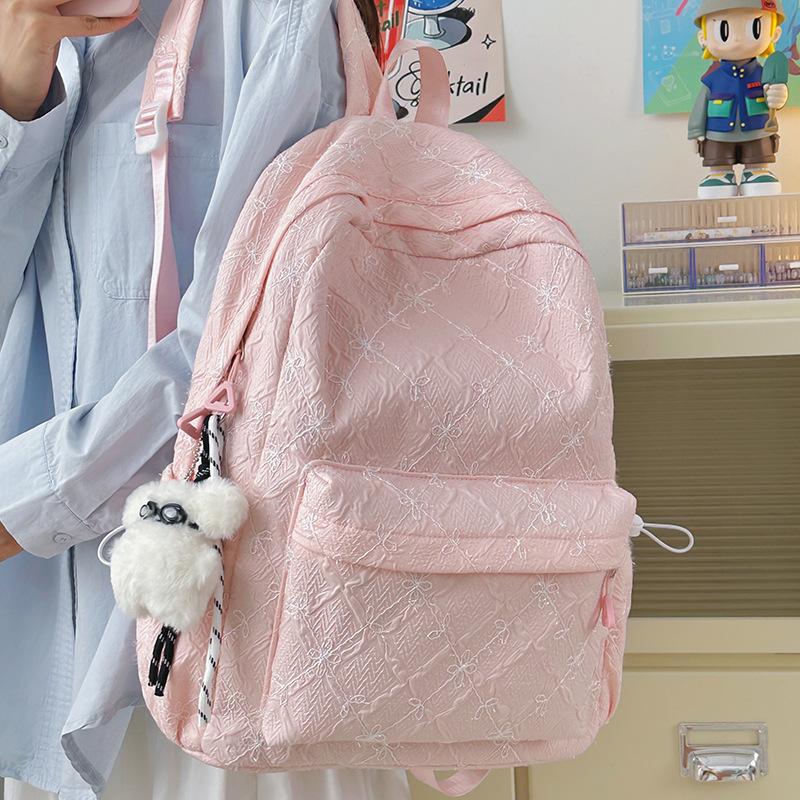 2025 new high-value travel lightweight junior high school student backpack women's large-capacity literary and versatile schoolbag