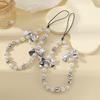 Elegant Pearl Bow Phone Lanyard for Women - Luxurious Beaded Wrist Strap, Fashionable and Versatile Anti-Lost Chain.