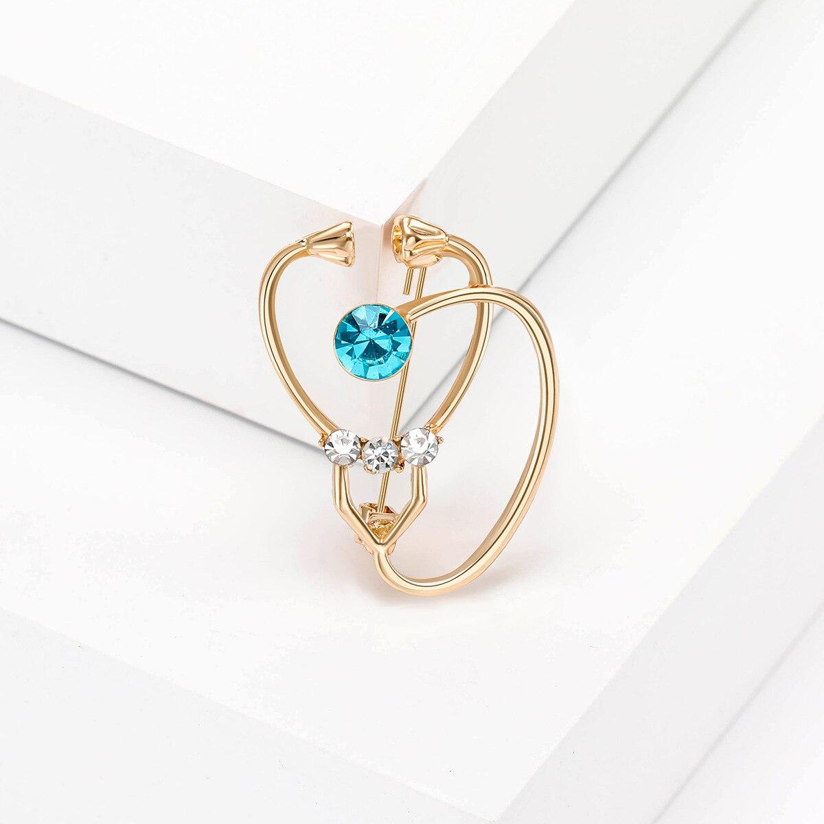 

Blucome, новинка 2023, броши-стетоскопы для женщин, унисекс, 2 цвета, больница, доктор, медсестра, офис, повседневная брошь, булавки, подарки золотой