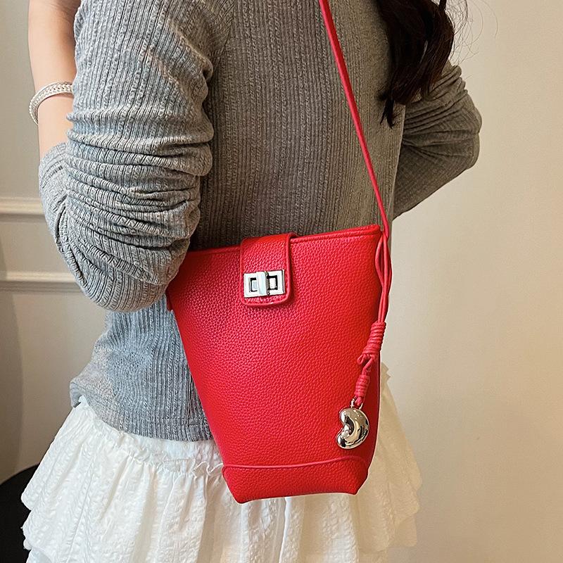 New Product Wholesale Advanced Sense Simple Solid Color Commuter Bucket Bag Women's Niche Casual Versatile Foreign Style Messenger Mobile Phone Bag